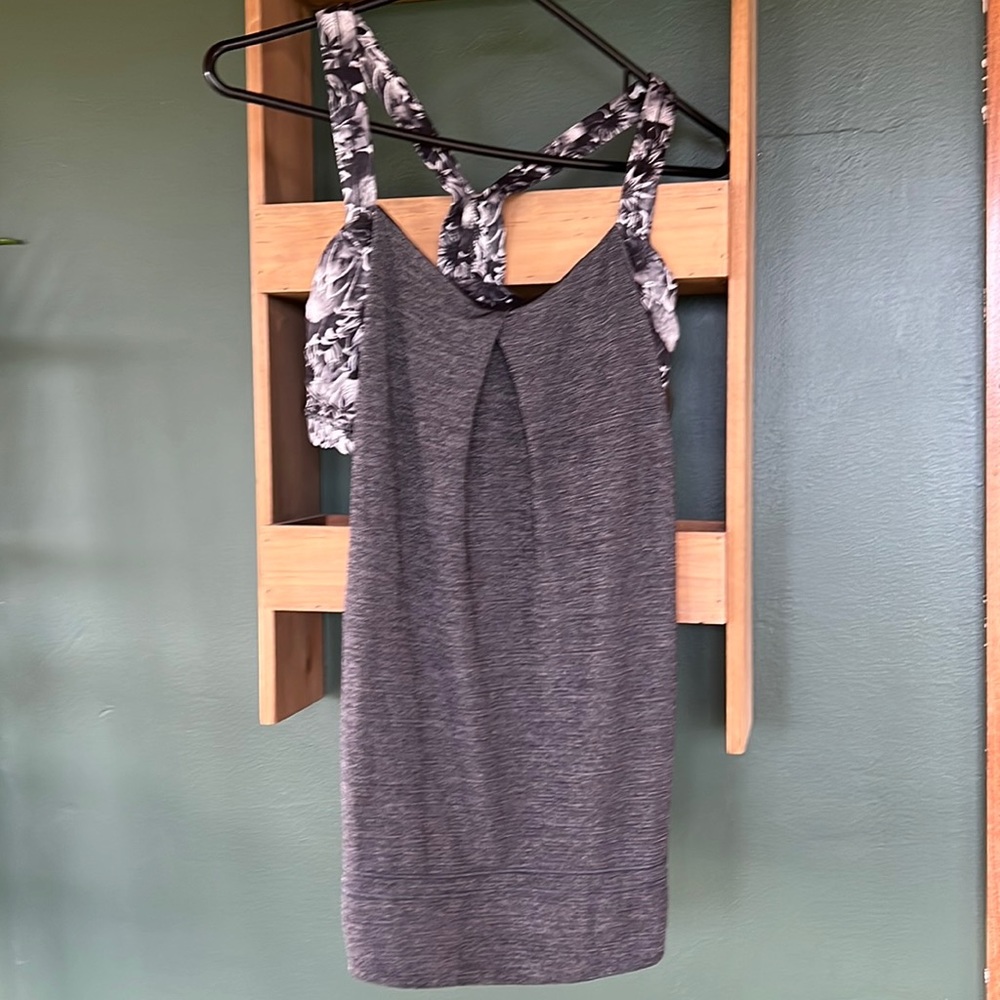 Lululemon top with built in bra. Size 6. Grey/black floral.